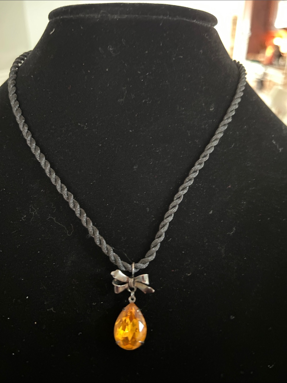 Braided Black Cord Necklace with Amber Teardrop and Silver Bow